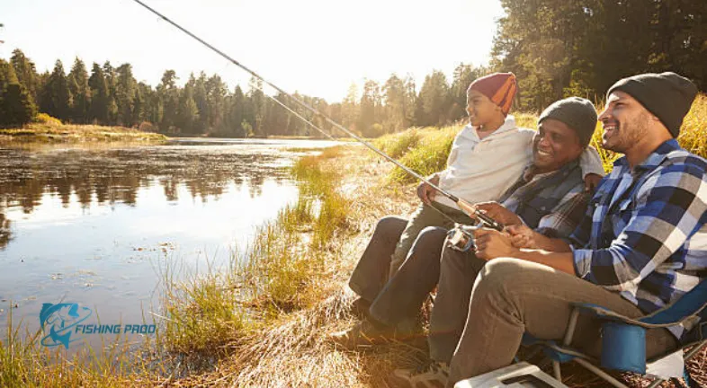 grandson-with-father-and-grandfather-fishing-by-lake